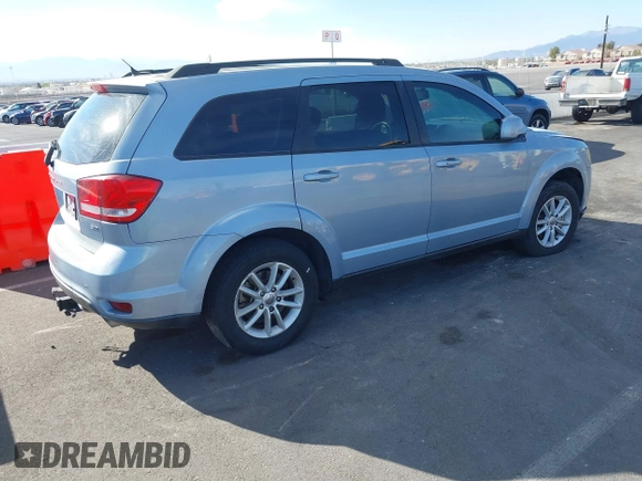 2013 Dodge Journey SXT with VIN 3C4PDCBG4DT584135, listed as a IAAI auction lot 41902149 with 165,700 mi miles and . Bid and sale history available at carsss.com. Image 4.
