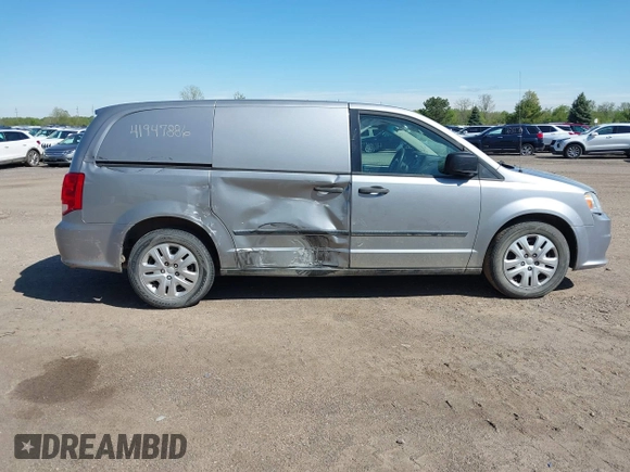 2014 Ram Cargo Van with VIN 2C4RRGAG9ER312915, listed as a IAAI auction lot 41947886 with 149,144 mi miles and . Bid and sale history available at DreamBid. Image 13.