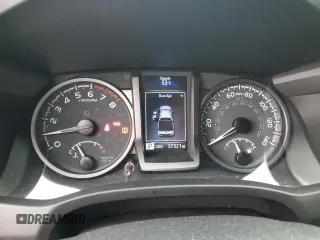 2020 Toyota Tacoma SR5 with VIN 3TMDZ5BN2LM097782, listed as a Copart auction lot 61573465 with 57,321 mi miles and Salvage title. Bid and sale history available at DreamBid. Image 9.