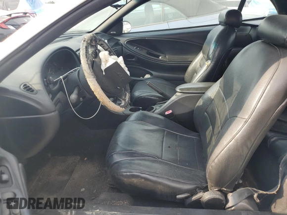 1998 Ford Mustang GT with VIN 1FAFP45X1WF263449, listed as a Copart auction lot 55851015 with 131,937 mi miles and Salvage title. Bid and sale history available at DreamBid. Image 7.