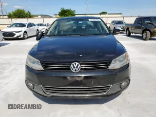 2013 Volkswagen Jetta TDI w/Premium with VIN 3VWLL7AJ7DM376862, listed as a Copart auction lot 59192445 with 163,224 mi miles and Salvage title. Bid and sale history available at DreamBid. Image 5.