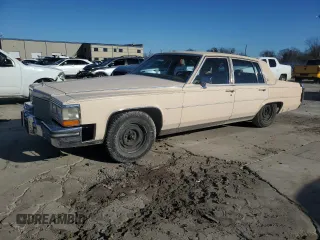1988 Cadillac Brougham z VIN 1G6DW51Y9J9710161, wystawiony jako Copart lot #87093424 z przebiegiem 59 519 mil mil oraz Tytuł czysty. Historia ofert i sprzedaży dostępna na DreamBid. Obrazek 1.