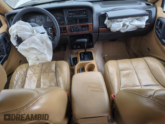 1996 Jeep Grand Cherokee Limited with VIN 1J4GZ78Y0TC185669, listed as a Copart auction lot 79032274 with 184,929 mi miles and Salvage Title. Bid and sale history available at carsss.com. Image 8.