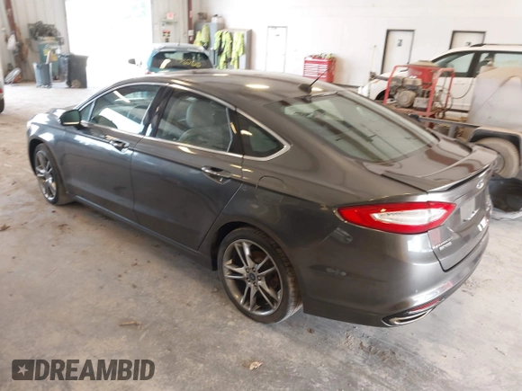 2016 Ford Fusion Titanium with VIN 3FA6P0D9XGR223354, listed as a IAAI auction lot 42621924 with Not provided miles and . Bid and sale history available at DreamBid. Image 3.