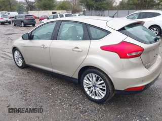 2017 Ford Focus Titanium with VIN 1FADP3N26HL207100, listed as a IAAI auction lot 41865961 with 220,850 mi miles and . Bid and sale history available at carsss.com. Image 3.