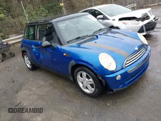 2006 MINI Hardtop with VIN WMWRC33566TK66280, listed as a IAAI auction lot 41752311 with 237,056 mi miles and . Bid and sale history available at DreamBid. Image 1.