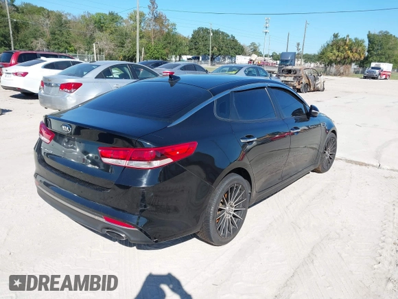 2018 Kia Optima LX with VIN 5XXGT4L3XJG203237, listed as a IAAI auction lot 40631696 with 157,012 mi miles and . Bid and sale history available at DreamBid. Image 4.