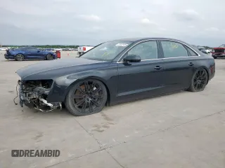 2011 Audi A8 z VIN WAURVAFD2BN005986, wystawiony jako Copart lot #57610145 z przebiegiem Nie podano mil oraz Tytuł czysty. Historia ofert i sprzedaży dostępna na DreamBid. Obrazek 1.