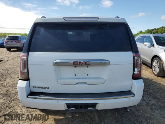 2015 GMC Yukon Denali z VIN 1GKS2CKJ9FR622342, wystawiony jako Copart lot #53671555 z przebiegiem Nie podano mil oraz Czysty tytuł • Clean title. Historia ofert i sprzedaży dostępna na DreamBid. Obrazek 6.