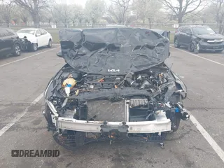 2024 Kia K5 GT-Line z VIN 5XXG64J22RG257080, wystawiony jako IAAI lot #42026127 z przebiegiem 19 477 mil mil oraz . Historia ofert i sprzedaży dostępna na DreamBid. Obrazek 12.