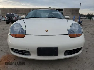 2000 Porsche Boxster z VIN WP0CA2980YU622861, wystawiony jako Copart lot #78993794 z przebiegiem 129 631 mil mil oraz Czysty tytuł • Clean title. Historia ofert i sprzedaży dostępna na DreamBid. Obrazek 5.