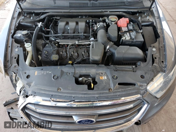 2014 Ford Taurus Limited с VIN 1FAHP2F88EG140714, выставлен на аукционе Copart как лот 58311785 с пробегом 74 794 миль миль и Списание • Salvage title. История ставок и продаж доступна на DreamBid. Изображение 11.