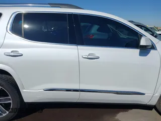 2019 GMC Acadia Denali with VIN 1GKKNPLS9KZ166469, listed as a IAAI auction lot 41857034 with 53,721 mi miles and . Bid and sale history available at carsss.com. Image 13.