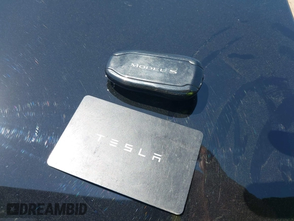 2022 Tesla Model S z VIN 5YJSA1E59NF470813, wystawiony jako IAAI lot #41935297 z przebiegiem Nie podano mil oraz . Historia ofert i sprzedaży dostępna na DreamBid. Obrazek 11.