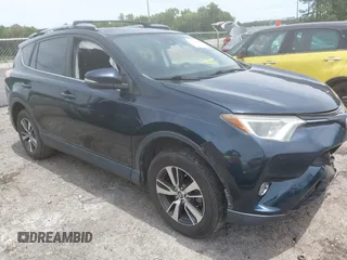 2018 Toyota RAV4 XLE with VIN JTMWFREVXJJ171545, listed as a IAAI auction lot 42326429 with 123,137 mi miles and . Bid and sale history available at DreamBid. Image 1.