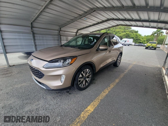 2020 Ford Escape Titanium Hybrid with VIN 1FMCU0DZ5LUB81972, listed as a IAAI auction lot 42679188 with 19,400 mi miles and . Bid and sale history available at DreamBid. Image 14.
