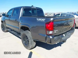 2023 Toyota Tacoma 4WD SR with VIN 3TYCZ5AN1PT146719, listed as a IAAI auction lot 41406963 with 19,735 mi miles. Bid and sale history available at carsss.com. Image 3.