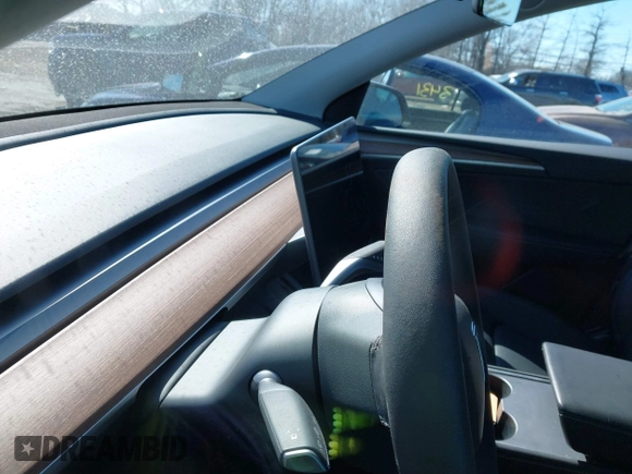 2024 Tesla Model Y Long Range with VIN 7SAYGDEE4RF149457, listed as a IAAI auction lot 41700922 with Not Provided miles. Bid and sale history available at carsss.com. Image 7.