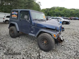 2001 Jeep Wrangler Sport with VIN 1J4FA49S01P363856, listed as a Copart auction lot 62494785 with 154,782 mi miles and Salvage title. Bid and sale history available at DreamBid. Image 4.