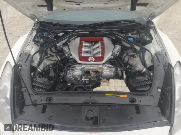 2015 Nissan GT-R Premium z VIN JN1AR5EF5FM281737, wystawiony jako Copart lot #80119804 z przebiegiem 50 726 mil mil oraz Szkoda całkowita • Salvage title. Historia ofert i sprzedaży dostępna na DreamBid. Obrazek 11.