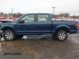 2019 Ford F-150 XL with VIN 1FTEW1EB3KFB10433, listed as a IAAI auction lot 41520139 with 104,405 mi miles and . Bid and sale history available at DreamBid. Image 14.