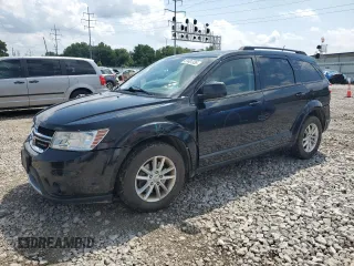 2013 Dodge Journey SXT with VIN 3C4PDDBG0DT532765, listed as a Copart auction lot 61481335 with 193,066 mi miles and Salvage title. Bid and sale history available at DreamBid. Image 1.