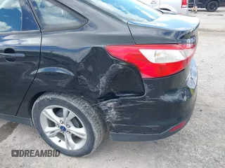 2013 Ford Focus SE z VIN 1FADP3F21DL370052, wystawiony jako IAAI lot #42208904 z przebiegiem 186 279 mil mil oraz . Historia ofert i sprzedaży dostępna na DreamBid. Obrazek 6.