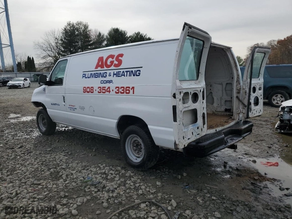2003 Ford Econoline Cargo Van with VIN 1FTNE24LX3HA35013, listed as a Copart auction lot 79853424 with 174,607 mi miles and Salvage Title. Bid and sale history available at carsss.com. Image 2.