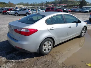 2015 Kia Forte LX with VIN KNAFK4A67F5340351, listed as a IAAI auction lot 41982078 with 217,530 mi miles. Bid and sale history available at carsss.com. Image 4.