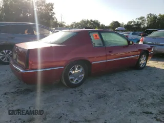 1998 Cadillac Eldorado z VIN 1G6EL12Y4WU610896, wystawiony jako Copart lot #74662244 z przebiegiem Nie podano mil oraz Szkody całkowita. Historia ofert i sprzedaży dostępna na DreamBid. Obrazek 3.