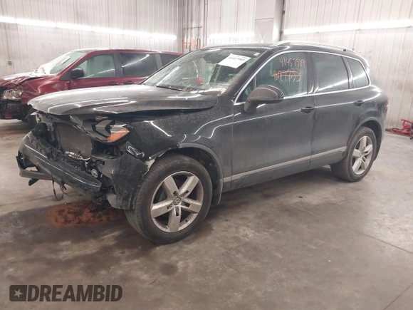2012 Volkswagen Touareg Sport with VIN WVGEF9BP8CD009511, listed as a IAAI auction lot 41457989 with 87,325 mi miles and . Bid and sale history available at DreamBid. Image 18.