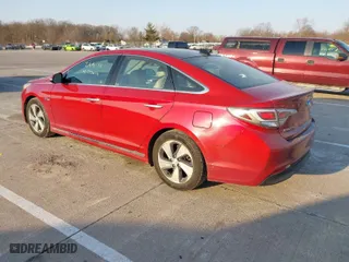 2016 Hyundai Sonata Hybrid Limited with VIN KMHE34L12GA021635, listed as a IAAI auction lot 41773019 with 152,826 mi miles. Bid and sale history available at carsss.com. Image 3.