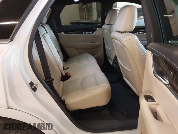 2017 Cadillac XT5 FWD with VIN 1GYKNARS7HZ121596, listed as a IAAI auction lot 41825879 with 82,023 mi miles and . Bid and sale history available at DreamBid. Image 8.