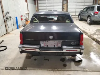 1988 Cadillac Eldorado z VIN 1G6EL1154JU615807, wystawiony jako Copart lot #76362924 z przebiegiem Nie podano mil oraz Tytuł czysty. Historia ofert i sprzedaży dostępna na DreamBid. Obrazek 6.