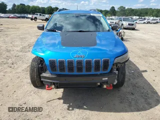 2019 Jeep Cherokee Trailhawk with VIN 1C4PJMBX0KD311114, listed as a Copart auction lot 58799765 with 60,833 mi miles and Salvage title. Bid and sale history available at DreamBid. Image 5.