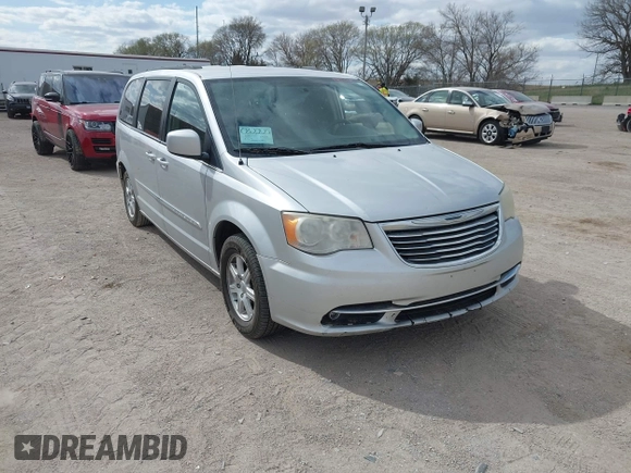 2011 Chrysler Town & Country Touring with VIN 2A4RR5DGXBR780044, listed as a IAAI auction lot 42035045 with 205,627 mi miles and . Bid and sale history available at DreamBid. Image 1.