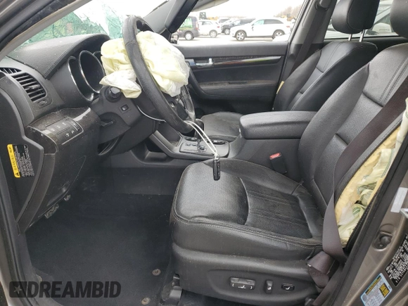 2012 Kia Sorento SX with VIN 5XYKW4A24CG243176, listed as a Copart auction lot 49816515 with 186,540 mi miles and Salvage Title. Bid and sale history available at carsss.com. Image 7.