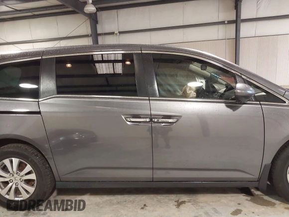 2015 Honda Odyssey EX-L with VIN 5FNRL5H65FB126479, listed as a IAAI auction lot 38993955 with 196,199 mi miles and . Bid and sale history available at carsss.com. Image 13.