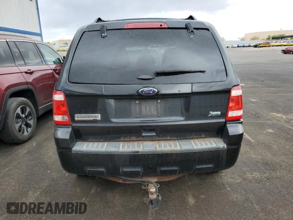 2011 Ford Escape XLT с VIN 1FMCU9DGXBKB21246, выставлен на аукционе Copart как лот 63517325 с пробегом 146 036 миль миль и Чистый • Clean title. История ставок и продаж доступна на DreamBid. Изображение 6.