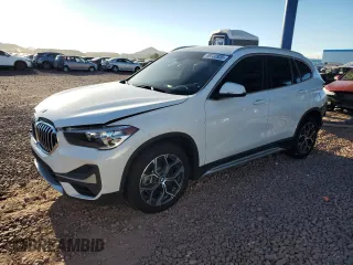2021 BMW X1 xDrive28i with VIN WBXJG9C08M5U21413, listed as a Copart auction lot 49733935 with 44,220 mi miles and Salvage Title. Bid and sale history available at carsss.com. Image 1.