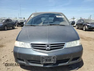 2003 Honda Odyssey EX-L z VIN 5FNRL189X3B088813, wystawiony jako Copart lot #56221685 z przebiegiem 204 443 mil mil oraz Szkoda całkowita • Salvage title. Historia ofert i sprzedaży dostępna na DreamBid. Obrazek 5.