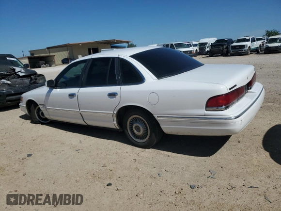 1995 Ford Crown Victoria z VIN 2FALP73W7SX158296, wystawiony jako Copart lot #56706735 z przebiegiem 104 884 mil mil oraz Czysty tytuł • Clean title. Historia ofert i sprzedaży dostępna na DreamBid. Obrazek 2.