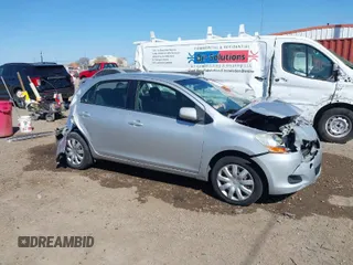 2009 Toyota Yaris with VIN JTDBT903491323280, listed as a IAAI auction lot 41770221 with 315,030 mi miles. Bid and sale history available at carsss.com. Image 1.