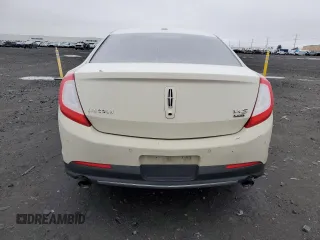 2014 Lincoln MKS EcoBoost с VIN 1LNHL9FT7EG601089, выставлен на аукционе Copart как лот 49483605 с пробегом 121 709 миль миль и Списание • Salvage title. История ставок и продаж доступна на DreamBid. Изображение 6.