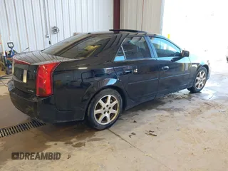 2003 Cadillac CTS with VIN 1G6DM57N630145426, listed as a IAAI auction lot 42141105 with 203,859 mi miles. Bid and sale history available at carsss.com. Image 4.