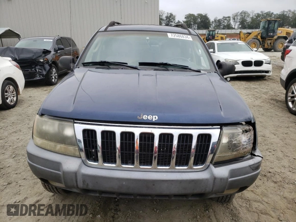 2002 Jeep Grand Cherokee z VIN 1J4GX38S42C229150, wystawiony jako Copart lot #72586834 z przebiegiem 201 103 mil mil oraz Szkoda całkowita • Salvage title. Historia ofert i sprzedaży dostępna na DreamBid. Obrazek 5.