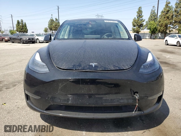 2024 Tesla Model Y Long Range with VIN 7SAYGDEE6RA219456, listed as a Copart auction lot 61855165 with 29,869 mi miles and Salvage title. Bid and sale history available at DreamBid. Image 5.