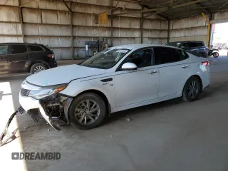 2019 Kia Optima LX z VIN 5XXGT4L31KG364951, wystawiony jako Copart lot #60118165 z przebiegiem 64 391 mil mil oraz Szkoda całkowita • Salvage title. Historia ofert i sprzedaży dostępna na DreamBid. Obrazek 1.