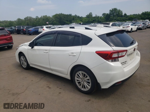 2017 Subaru Impreza Premium with VIN 4S3GTAD62H3736698, listed as a Copart auction lot 60856225 with 180,533 mi miles and Salvage title. Bid and sale history available at DreamBid. Image 2.