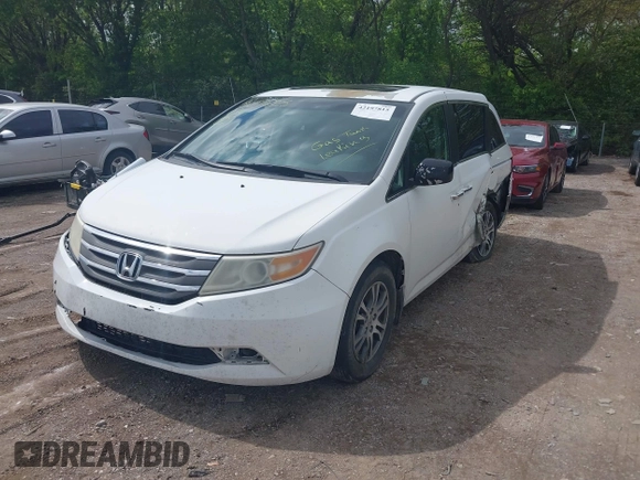 2012 Honda Odyssey EX-L with VIN 5FNRL5H63CB117341, listed as a IAAI auction lot 42197815 with 256,544 mi miles and . Bid and sale history available at DreamBid. Image 17.